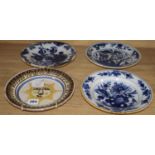 A collection of five 18th century Delft dishes, largest diameter 23cm