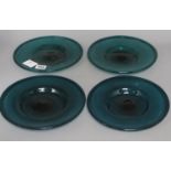 Four Venetian blue glass plates, diameter 22cm