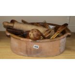 A terracotta bowl, a pill roller and a collection of wood spatula's, forks, spoons, etc,