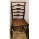 An 18th/19th century ash and elm ladder-back chair