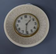 An eight day ivory travelling clock, diameter 11cm