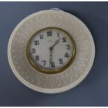 An eight day ivory travelling clock, diameter 11cm