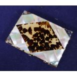 A tortoiseshell and mother of pearl card case