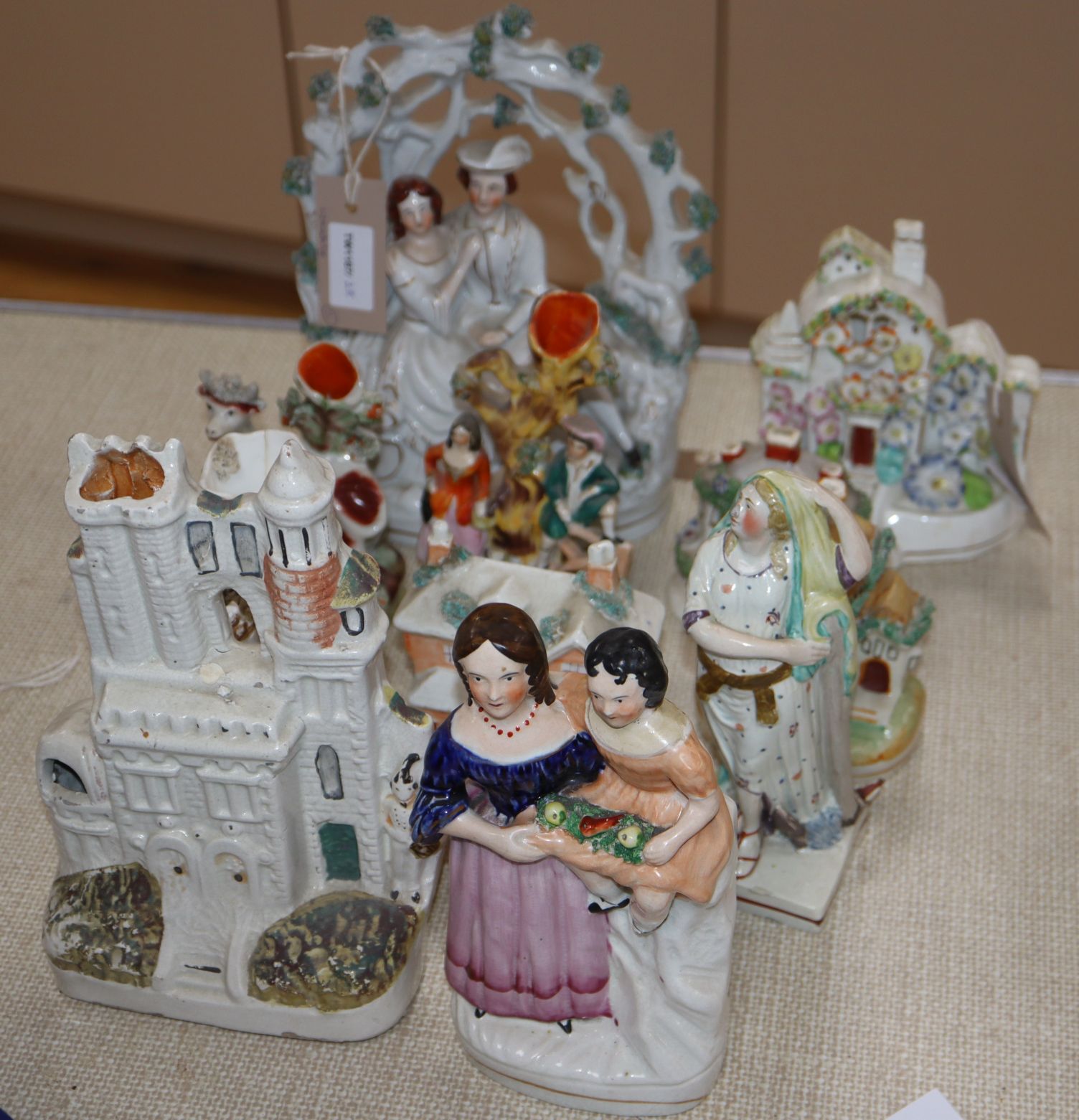 Eleven Staffordshire pottery figures and cottage pastille burners - Image 5 of 5