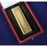 A Cartier gold-plated lighter, cased