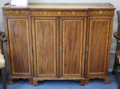 An Edwardian inlaid mahogany breakfront side cabinet, W.140cm, D.38cm, H.106cm