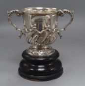 A late Victorian demi-spiral fluted silver two handled silver trophy cup, Aldwinckle & Slater,