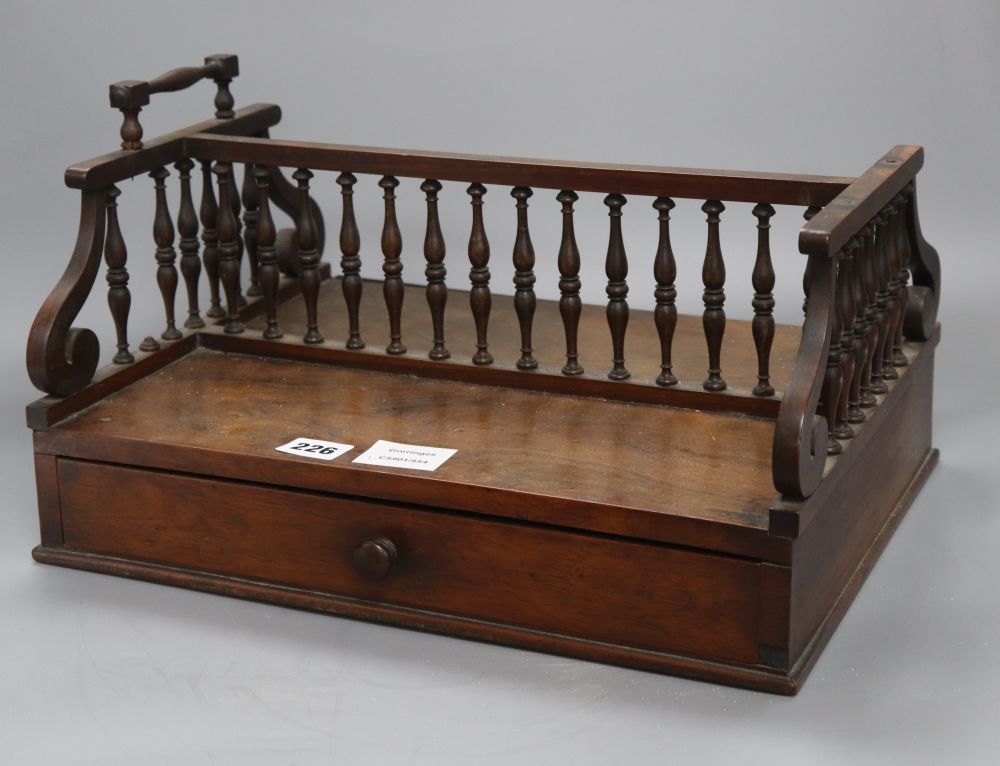 A Regency rosewood book rack, length 39cm