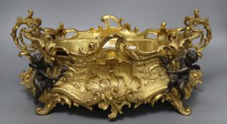 A Victorian style ormolu centrepiece, mounted with cherubs, length 43cm