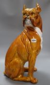A large tinglaze pottery figure of a boxer dog, height 50cmCONDITION: Crazed throughout as well as
