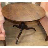 An early 19th century oak tilt top tea table, Diam.90cm