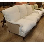 A Howard & Sons upholstered three seater settee, W.190cm D.96cm H.86cmCONDITION: The frame is