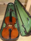 A late 19th century European violin with inlaid decoration, cased with bow, Joseph Guanaris label to