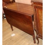 A mid Victorian mahogany drop leaf dining table, L.132cm extended