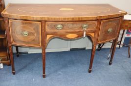 A George III mahogany and marquetry bowfront sideboard, W.170cm, D.74cm, H.93cmCONDITION: The top is