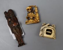 Two Japanese ivory netsuke/okimono carvings and a hardwood figural netsuke, longest 9cm