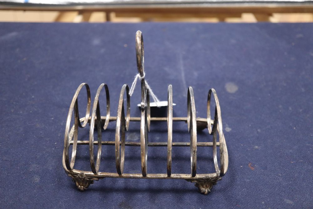 A Victorian silver seven bar toastrack, William Evans, London, 1865, height 13.5cm, 70z.CONDITION: - Image 3 of 4