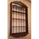 A mahogany four tier wall bracket, W.55cm, D.11cm, H.94cm,