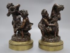 A pair of neo-classical style bronzes of children and a monkey, height 22cm