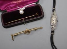 A 15ct and cultured pear dress stud, gross 2 grams, a paste set cocktail watch, a stick pin and a