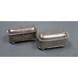 A pair of late 19th/early 20th century Chinese white metal oval pin boxes, on ball feet, by Tuck