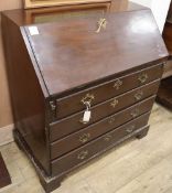 A George III mahogany bureau, W.91cm, D.50cm, H.100cmCONDITION: The timber has quite a dull matt