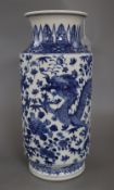 A large Chinese blue and white cylindrical dragon vase, with Kangxi mark, height 37cmCONDITION: An