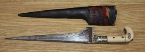 A 19th century Eastern bone handled dagger, length excluding scabbard 34.5cm