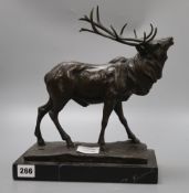 A bronze stag, signed Milo, on marble base, height 31cm