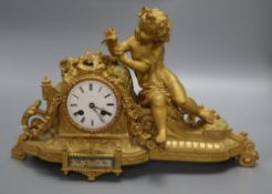 A French gilt spelter figural mantel clock, with Sevres style plaque, height 26cm