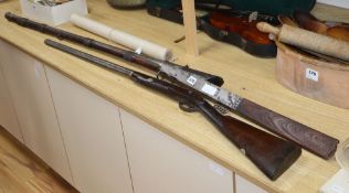 A 19th century percussion cap musket and an Eastern musket