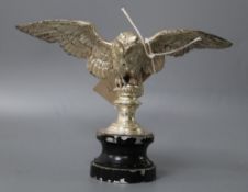 A silvered metal 'owl' car mascot, height 15cm