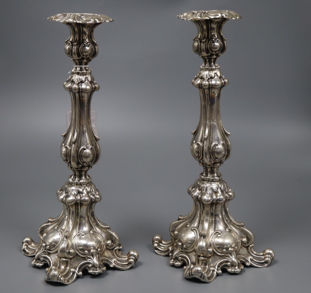 A pair of early 20th century Austro Hungarian 800 standard white metal candlesticks, maker WD,