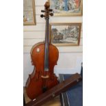 A cello and two bows, cello height 123cm