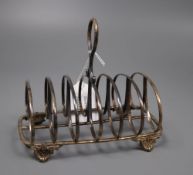 A Victorian silver seven bar toastrack, William Evans, London, 1865, height 13.5cm, 70z.CONDITION: