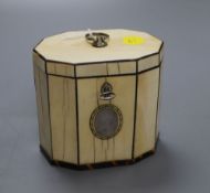 A George III decagonal ivory and tortoiseshell veneered tea caddy, height 10cm