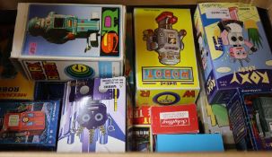 A collection of Chinese and Japanese-made collectors' small clockwork robots, including Mechanical