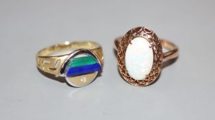 A 14k and white opal oval dress ring and a 585 diamond and chalcedony? set modern ring, sizes M/N,