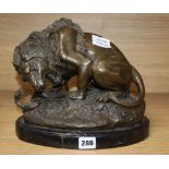 After A. Barye. A bronze of lion and a snake, height 24cm