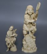 A Japanese ivory okimono of an elder and a dragon, and a marine ivory carving of Daikoku, tallest