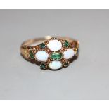 A Victorian yellow metal, white opal and emerald set cluster ring, size N/O, gross 25 grams.