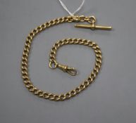 An 18ct gold albert chain, 35cm, gross 54.2 grams.CONDITION: T-Bar & clasp unmarked. Some wear