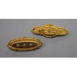 Two Victorian 15ct oval brooches, with cannetile work decoration, one with seed pearls and one