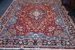 A Kashan carpet, 350 x 244cm