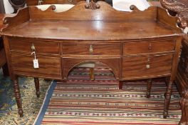 A Regency mahogany bow-fronted sideboard, W.144cm, D.52cm, H.82cmCONDITION: The top is ring marked