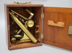 A mahogany cased brass microscope