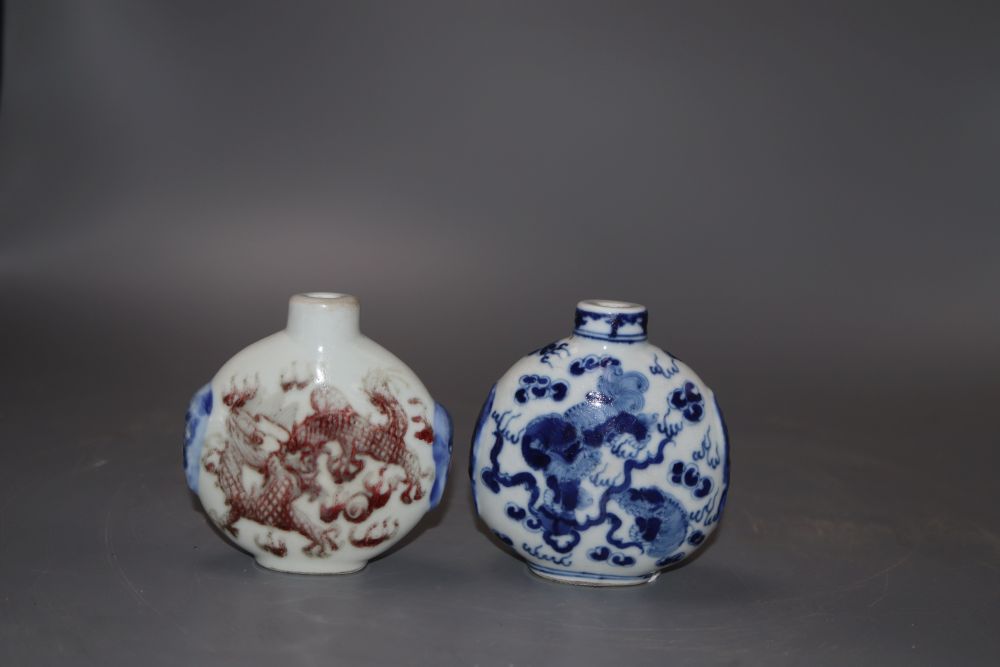 A Chinese blue and white snuff bottle and an underglazed copper snuff bottle, tallest