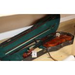 A 20th century Antonius Stradivarius Cremonensis violin, cased with two bows