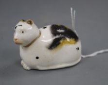 A Derby porcelain figure of a recumbent cat, c.1830, incised '1' to the base