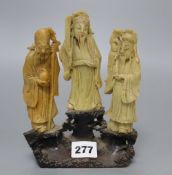 Three Chinese soapstone carvings of immortals, on base, height 19cm